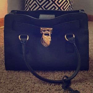Authentic Micheal Kors tote with strap
